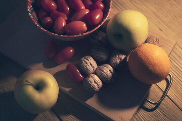 Close up of vegetables and fruits on wooden table