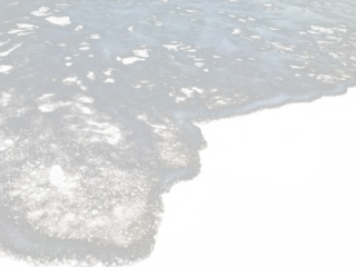 Texture of sea waves with white foam on a sandy beach, isolated transparent