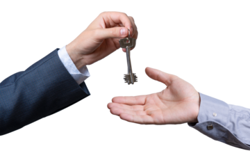 Man giving a key to another person in a simple and clear manner