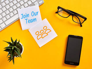 Business team recruiting new members using sticky notes and digital devices