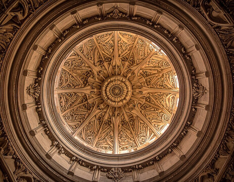 Ornate dome ceiling, complex carved details, viewed from below