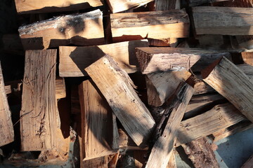 Pile of firewood chopped for burning in the oven.