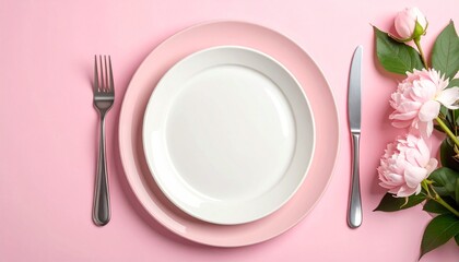 Elegant table setting with pink and white plates, silverware, roses, and scattered petals—evoking romance, celebration, and the floral choreography of dining, detail, and decor.