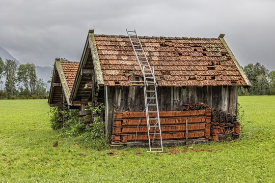 Roof of a small hut destroyed by hail, storm on 26.8.23 near Benediktbeuern, Bavaria, Germany