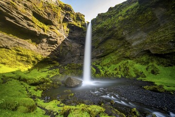 Kvernufoss waterfall, in summer when the weather is fine, gorge and river, long exposure, Skogar, Sudurland, South Iceland, Iceland
