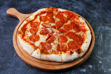 Pepperoni Pizza On Wooden Board With Melted Cheese, Ready To Share