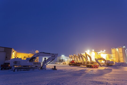 Dredgers and equipment for oil production in the Arctic, twilight, winter, Deadhorse, Alaska, USA