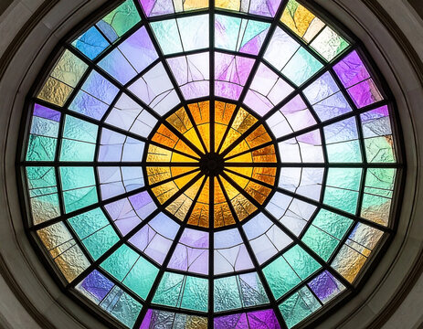 Stained glass dome, round pattern, colorful panes, metal framework