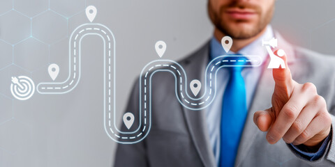 Business and Project Roadmap Concept. Touching on virtual screen with roadmap overlay representing steps in a project or strategic planning process. Waypoint icons and ends with goal achievement.