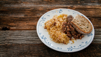 Black pudding or blood sausage kaszanka with sauerkraut
