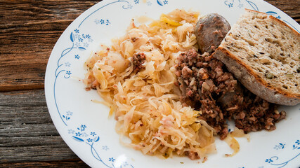Black pudding or blood sausage kaszanka with sauerkraut