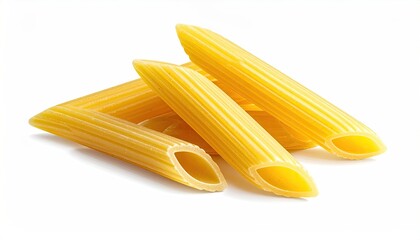 Close-up of raw, ridged pasta tubes on white background