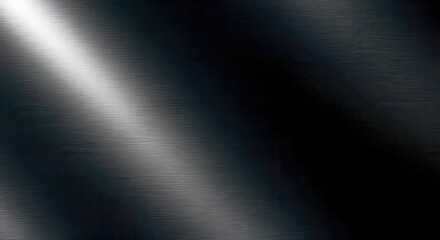 Dark metal texture with a light streak across the surface.