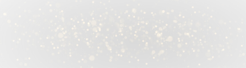 Soft Blur Light Glow with Sparkling Transparent Dust, Shiny Bokeh Effect and Warm Christmas Decoration for Elegant Abstract Background