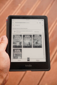 Kindle e-reader displaying The Stormlight Archive by Brandon Sanderson