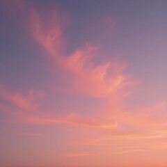 Fototapeta premium Sun paints orange hues on fluffy clouds at sunset.