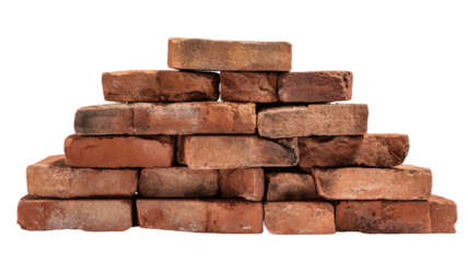 Stacked pile of red bricks construction materials isolated on white background