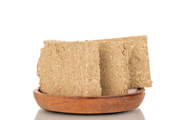 Fragrant sweet halva isolated on white background, macro.