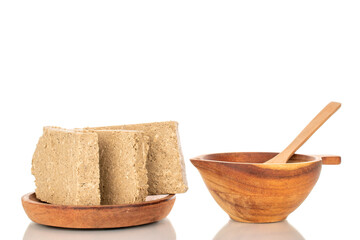 Fragrant sweet halva isolated on white background, macro.