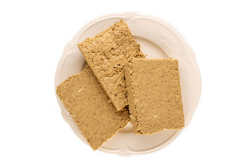 Fragrant sweet halva on the table, top view, macro.