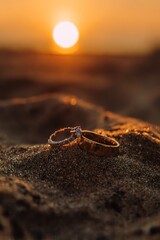 Golden Hour Wedding Rings on Beach at Sunset