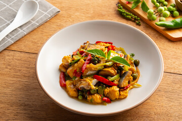 Thai Spicy stir fried Siriped catfish with chilli green peppercorn Fingerroot and kaffir lime leaves.(Pla Sawai Pad Cha)