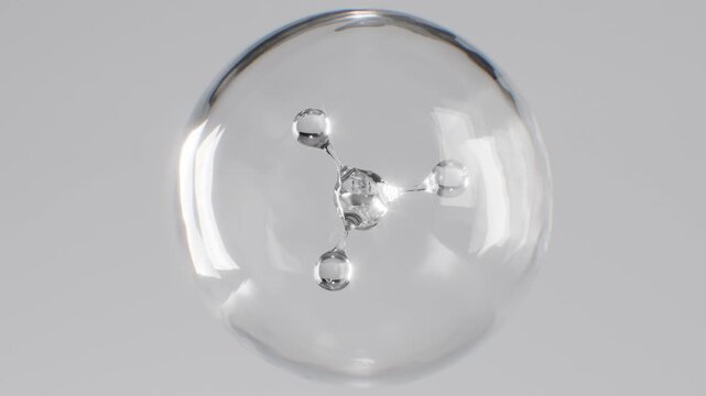 The process of molecule formation inside a transparent sphere. Abstract animation for cosmetic product advertising with a transparent texture.