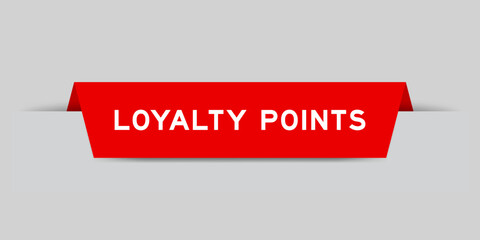 Red color inserted label with word loyalty points on gray background