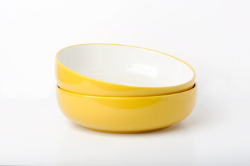 Yellow ceramic food Bowls on white background 
