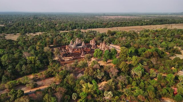 Aerial view of ancient pre rup temple at angkor, cambodia, Aerial view. A majestic tenth century hindu temple surrounded by dry jungle forest. Unesco heritage site.