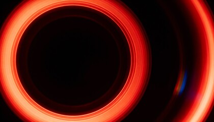 Glowing red concentric light rings creating a tunnel effect against a dark black background.