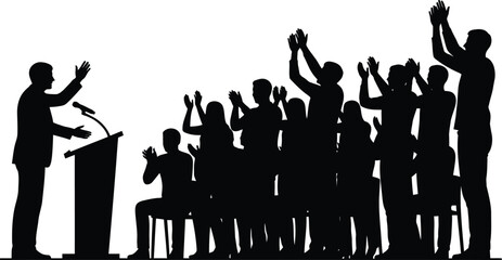 Silhouette of audience applauding speaker at podium