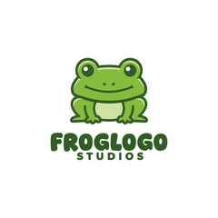 Cheerful frog rests above studio branding