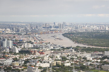 Fototapeta premium Aerial Cityscape of Bangkok with Dense Buildings