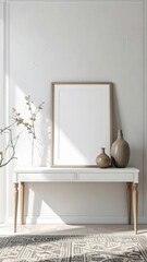 Blank picture frame on a white console table with decorative vases and sunlight streaming in creating a serene and elegant interior scene.
