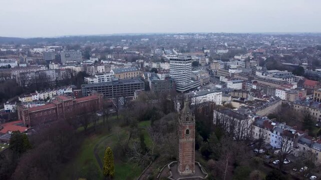 Rising and paning down to focus on Cabot Tower in Brandon Hill Park in Bristol. 