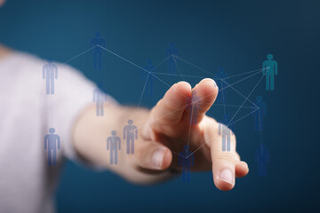 Hand touching digital network connections, human symbols. Teamwork, communication, social network, business, in