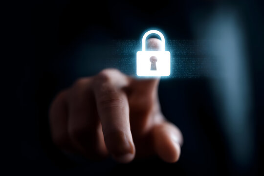 A person interacting with a digital security lock, symbolizing cybersecurity and protection in the digital era.