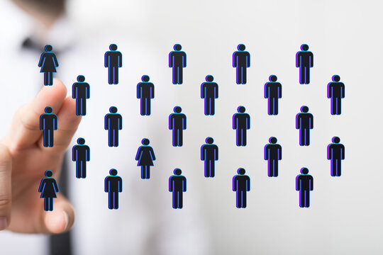 Hand touching digital icons representing people, showcasing concepts like network, communication, teamwork, and