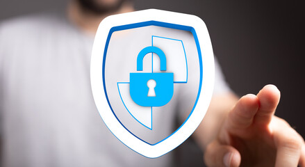 Obraz premium Concept of cybersecurity, data protection, and online safety. Person interacting with a digital shield and lock, representing secure