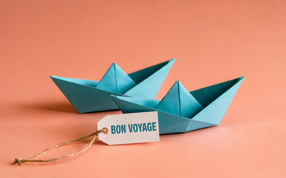 Bon Voyage Travel and Journey Concept with Blue Paper Boats