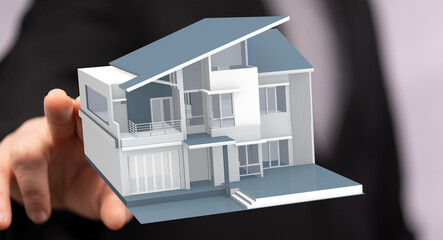 Person presenting a 3D model of a modern house symbolizing real estate, investment, and...