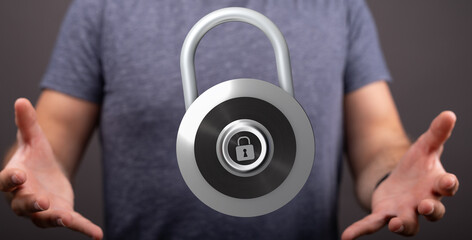 Concept of online safety with a man holding a lock. Representing protection, secure access and online privacy.