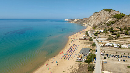 Aerial view of the beach and coastline of Siculiana Marina, in province of Agrigento, Sicily, Italy. It is a long sandy coast overlooking the Mediterranean Sea, whose waters are blue and turquoise.