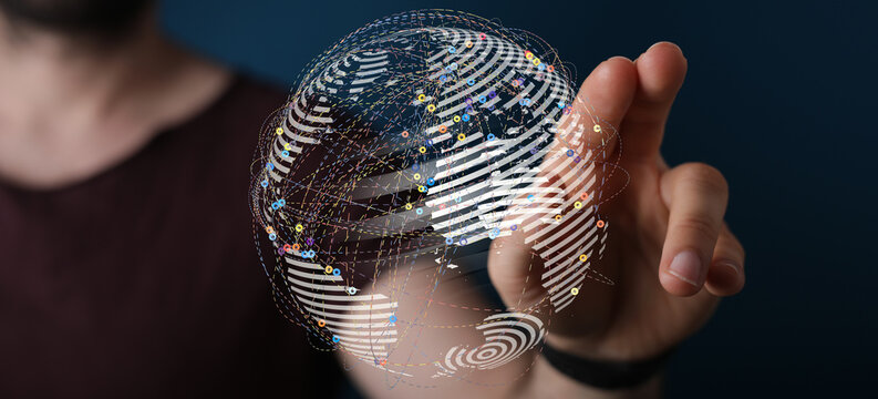 Hand reaching out to the digital globe, a visual representation of the internet, with data streams connecting. Symbolizing global net