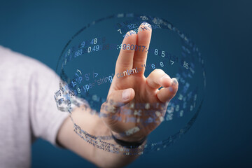 A hand touches a digital sphere, representing data interaction, technology, and futuristic concepts. Great for illustrating innovatio