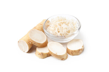Grated horseradish and cut root isolated on white