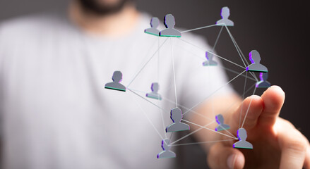 A hand touches a 3D social network diagram, illustrating connection, global communication and teamwork. Ideal for tech, business, and networking