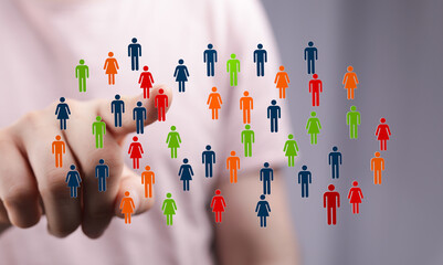 Concept of community and teamwork represented by colorful digital human figures symbolizing collaboration and connection. Ideal for social media