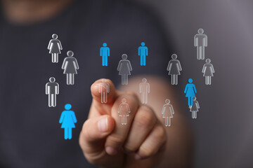 Hand reaching out to select people in network, concept of networking, choosing the right person, connect people